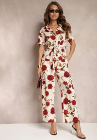 Renee - Beżowo-Bordowe Szerokie Spodnie w Kwiatowy Print z Kieszonkami Pomgranata. Kolor: beżowy. Materiał: tkanina. Wzór: kwiaty, nadruk. Sezon: lato