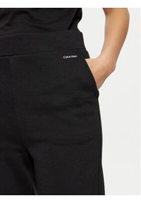 Calvin Klein Spodnie dresowe K20K208330 Czarny Relaxed Fit. Kolor: czarny. Materiał: bawełna