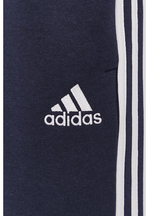 Adidas - adidas - Spodnie. Okazja: na co dzień. Kolor: niebieski. Materiał: dzianina, poliester. Styl: casual