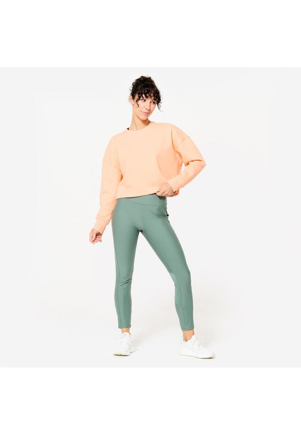 DOMYOS - Bluza damska Domyos Gym & Pilates crop. Kolor: pomarańczowy. Materiał: bawełna, włókno, dzianina, materiał. Długość: krótkie. Sport: joga i pilates