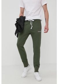 Champion - Spodnie. Kolor: zielony. Materiał: bawełna, dzianina