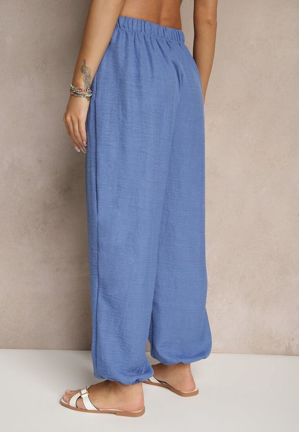 Renee - Niebieskie Spodnie Joggery High Waist ze Ściągaczami Korilanea. Okazja: na co dzień. Stan: podwyższony. Kolor: niebieski. Styl: elegancki, casual