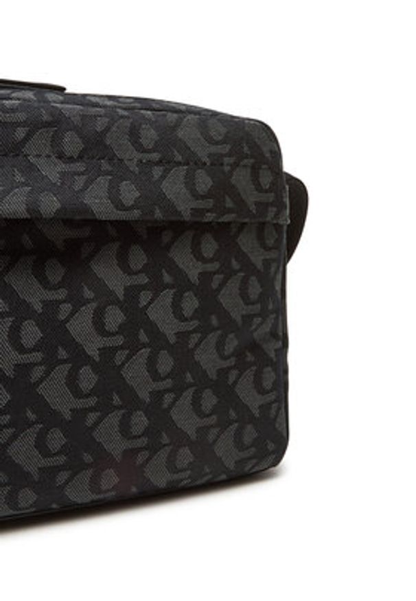 Calvin Klein Saszetka Slouched Monogram Mini Zip Fligh LV04G3175G Czarny. Kolor: czarny. Materiał: materiał
