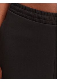 Hugo - HUGO Spodnie dresowe Nalosia 50530447 Czarny Loose Fit. Kolor: czarny. Materiał: bawełna #2