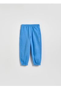 Reserved - Bawełniane spodnie jogger - niebieski. Kolor: niebieski. Materiał: bawełna #1
