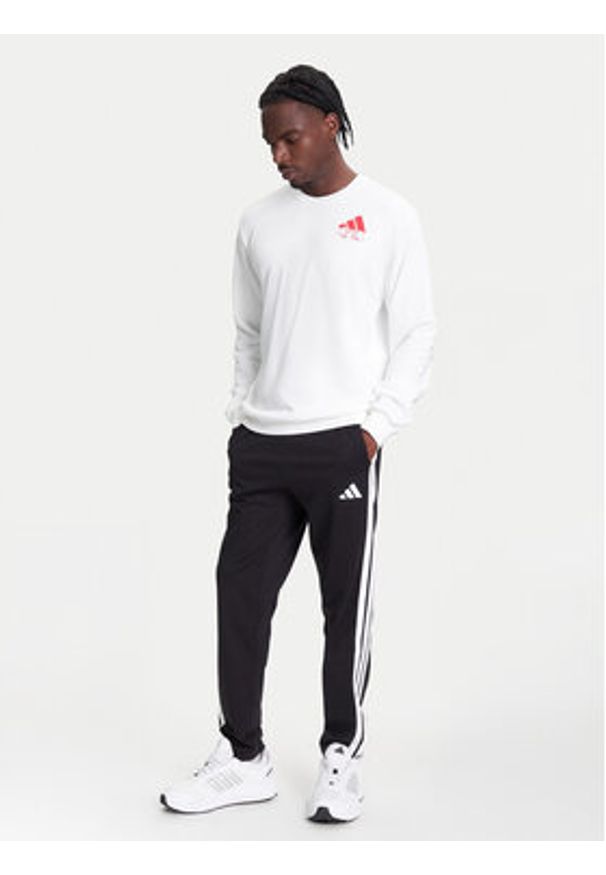 Adidas - adidas Spodnie dresowe Essentials 3-Stripes JE6430 Czarny Regular Fit. Kolor: czarny. Materiał: bawełna