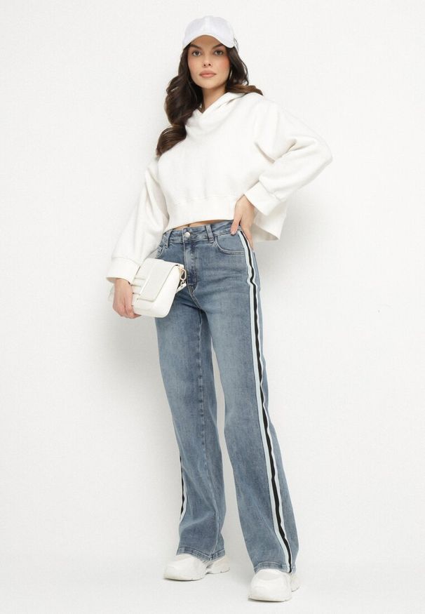 Born2be - Niebieskie Jeansy o Szerokim Kroju z Wysokim Stanem i Lampasami Sesariana. Okazja: na co dzień. Stan: podwyższony. Kolor: niebieski. Styl: elegancki, casual