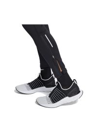 Spodnie legginsy męskie do biegania Nike Dri-FIT Challenger CZ8830. Materiał: materiał, poliester, skóra. Technologia: Dri-Fit (Nike). Sport: fitness #3