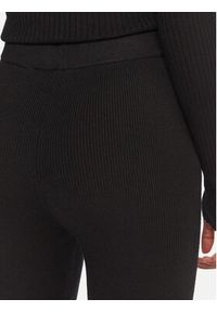 Guess Legginsy V5BB08 Z3JD2 Czarny Flare Fit. Kolor: czarny. Materiał: syntetyk