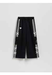 Reserved - Spodnie dresowe z kokardkami - czarny. Kolor: czarny. Materiał: dresówka #1