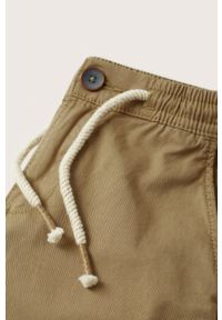 Mango Kids spodnie bawełniane dziecięce Quique kolor brązowy gładkie. Okazja: na co dzień. Kolor: brązowy. Materiał: bawełna. Wzór: gładki. Styl: casual