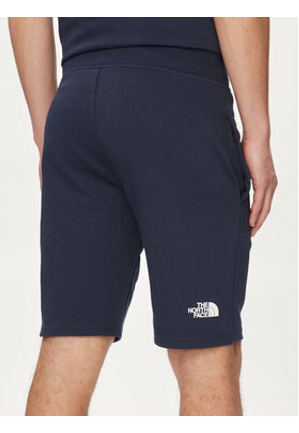 The North Face Szorty sportowe Standard NF0A3S4E Granatowy Regular Fit. Kolor: niebieski. Materiał: bawełna. Styl: sportowy