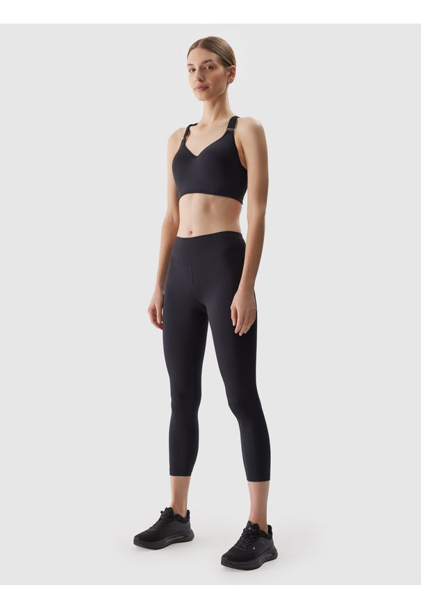 4f - Legginsy treningowe z materiału z recyklingu damskie - czarne. Kolor: czarny. Materiał: materiał. Wzór: ze splotem, jednolity, gładki. Sport: joga i pilates, fitness