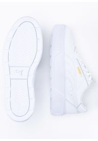 Sneakersy damskie białe Puma Karmen Rebelle. Zapięcie: pasek. Kolor: biały. Materiał: materiał, guma. Szerokość cholewki: normalna. Obcas: na platformie #4