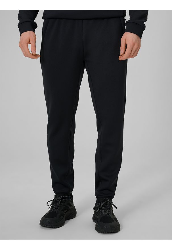4f - 4F Spodnie treningowe szybkoschnące męskie - czarne M. Kolor: czarny. Materiał: materiał. Sport: fitness