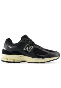 Buty New Balance M2002RIB - czarne. Okazja: na co dzień. Kolor: czarny. Materiał: guma, zamsz, skóra. Szerokość cholewki: normalna. Sport: bieganie