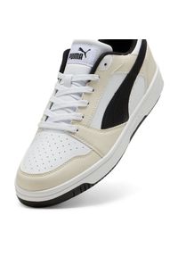 Buty Puma Rebound V6 Low 392328 18 białe. Okazja: na co dzień. Zapięcie: pasek. Kolor: biały. Materiał: skóra, tkanina, syntetyk, guma, materiał. Szerokość cholewki: normalna. Wzór: paski. Sport: koszykówka