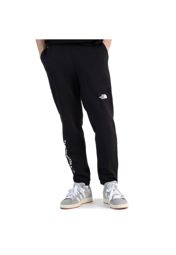 Spodnie The North Face Tech 0A5312WZY1 - czarne. Kolor: czarny. Materiał: bawełna, materiał, nylon, poliester