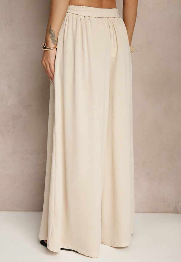 Renee - Beżowe Spodnie z Bawełną o Szerokim Kroju High Waist z Paskiem Iveleldi. Stan: podwyższony. Kolor: beżowy. Materiał: bawełna. Styl: elegancki