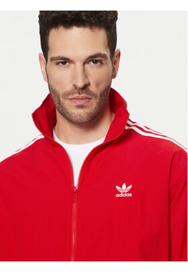 Adidas - adidas Bluza adicolor Firebird IT2495 Czerwony Loose Fit. Kolor: czerwony. Materiał: syntetyk