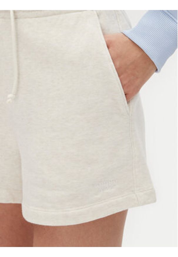 Tommy Jeans Szorty sportowe Tjw Script Short Ext DW0DW20353 Beżowy Regular Fit. Kolor: beżowy. Materiał: bawełna