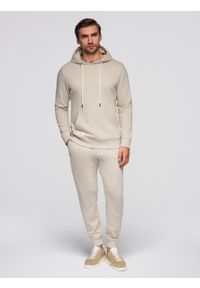 Ombre Clothing - Męski bawełniany komplet dresowy bluza kangurka + spodnie joggery - jasnobeżowy V1 - Rozmiar: L. Okazja: na co dzień. Kolor: beżowy. Materiał: bawełna, dresówka. Wzór: aplikacja. Styl: casual, klasyczny, sportowy