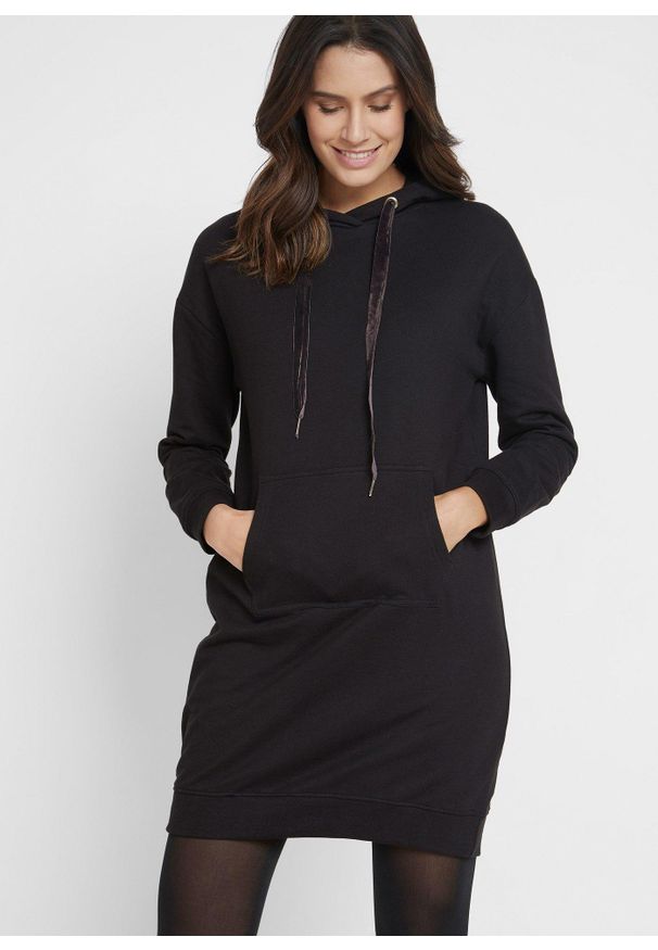 bonprix - Bawełniana sukienka dresowa. Typ kołnierza: kaptur. Kolor: czarny. Materiał: bawełna, dresówka