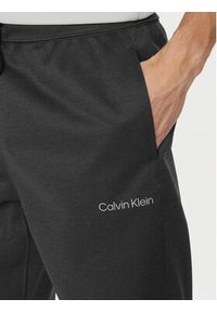 Calvin Klein Performance Spodnie dresowe 00GMF3P613 Czarny Regular Fit. Kolor: czarny. Materiał: syntetyk