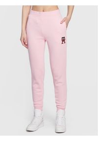 TOMMY HILFIGER - Tommy Hilfiger Spodnie dresowe Monogram Emb WW0WW37435 Różowy Regular Fit. Kolor: różowy. Materiał: bawełna, syntetyk #1