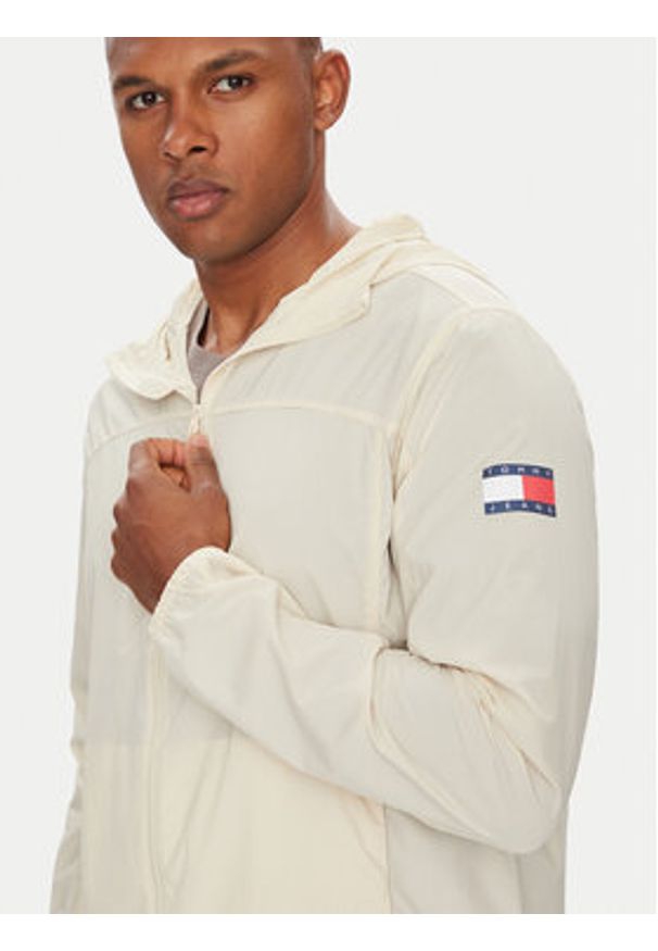 Tommy Jeans Kurtka przejściowa DM0DM21669 Beżowy Regular Fit. Kolor: beżowy. Materiał: syntetyk
