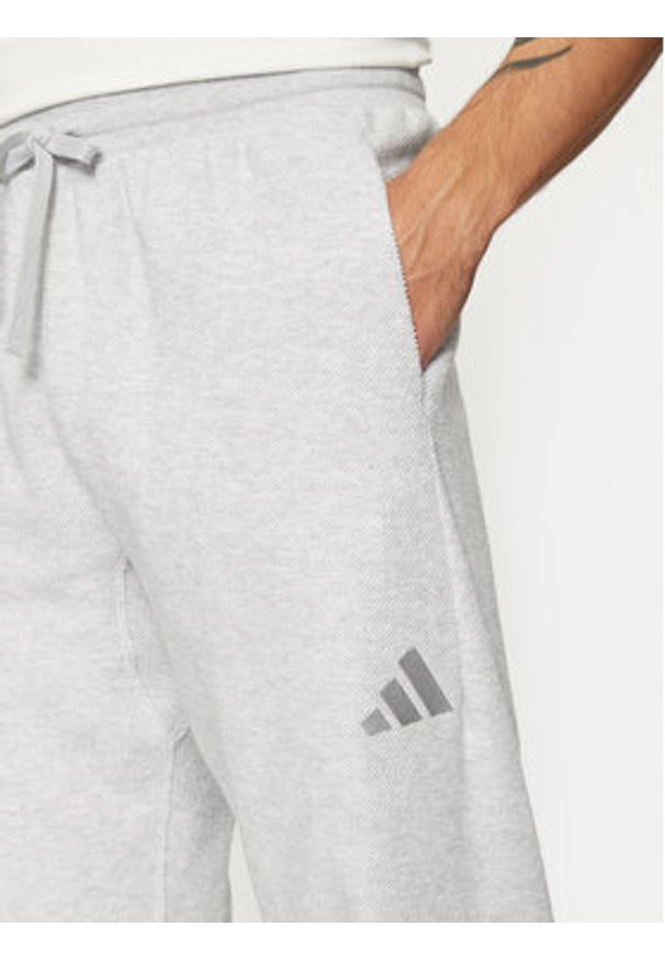 Adidas - adidas Spodnie dresowe Elevated ALL SZN Terry Loop IY6582 Szary Loose Fit. Kolor: szary. Materiał: bawełna