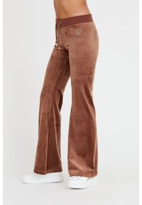 Juicy Couture - JUICY COUTURE Brązowe spodnie Rodeo Layla. Kolor: brązowy