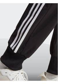 Adidas - adidas Spodnie dresowe AEROREADY Essentials Tapered Cuff Woven 3-Stripes Joggers IC0041 Czarny Regular Fit. Kolor: czarny. Materiał: syntetyk #5