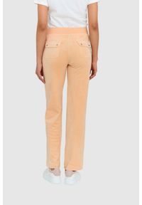 Juicy Couture - JUICY COUTURE Klasyczne welurowe spodnie dresowe damskie del ray w brzoskwiniowym kolorze, Rozmiar XS. Kolor: pomarańczowy. Materiał: welur, dresówka
