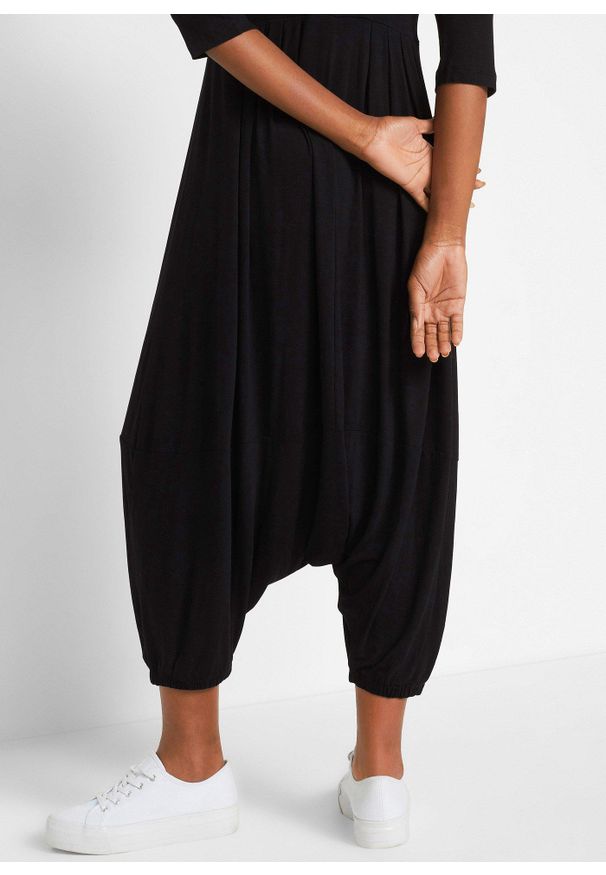 bonprix - Kombinezon z dżerseju z lejącej mieszanki wiskozy. Kolor: czarny. Materiał: jersey, wiskoza