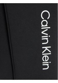 Calvin Klein Jeans Spodnie dresowe IU0IU00681 Czarny Regular Fit. Kolor: czarny. Materiał: bawełna