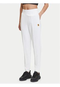 Nike Spodnie dresowe Court DA4722 Biały Slim Fit. Kolor: biały. Materiał: syntetyk