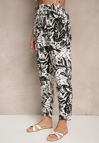 Renee - Białe Spodnie z Wiskozą o Szerokim Kroju High Waist w Kwiatowy Wzór Ellorine. Okazja: na co dzień. Stan: podwyższony. Kolor: biały. Materiał: wiskoza. Wzór: kwiaty. Styl: casual, elegancki