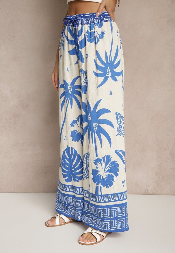 Renee - Niebieskie Szerokie Spodnie z Gumką w Pasie w Stylu Boho Evirami. Kolor: niebieski. Sezon: lato. Styl: boho