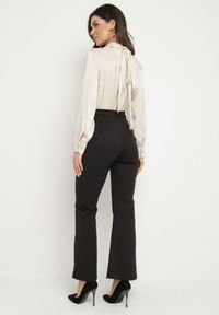 Born2be - Czarno-Beżowy Elegancki Kombinezon z Koszulową Górą z Wiązaniem i Ozdobnymi Guzikami Noriti. Okazja: na co dzień, na spotkanie biznesowe, do pracy. Kolor: czarny. Materiał: skóra. Długość rękawa: długi rękaw. Długość: długie. Styl: elegancki #7