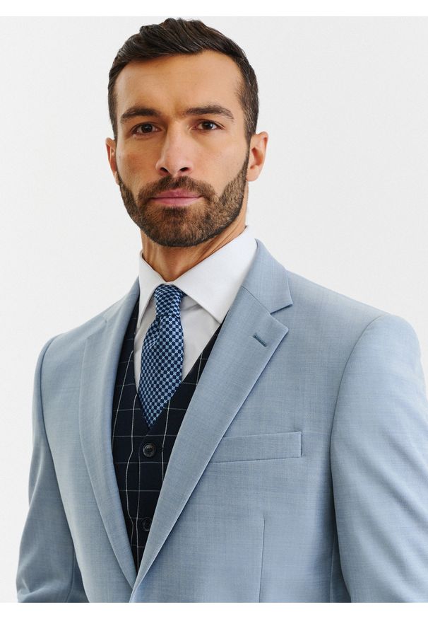 Pako Lorente - PAKO LORENTE – Błękitna marynarka garniturowa o widocznej strukturze. Okazja: na ślub cywilny, na wesele, na komunię. Kolor: niebieski. Materiał: wełna. Styl: elegancki