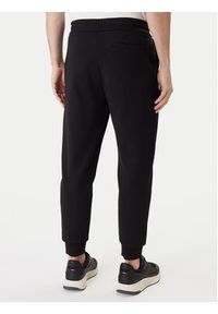 BOSS Spodnie dresowe 50555853 Czarny Regular Fit. Kolor: czarny. Materiał: bawełna #4