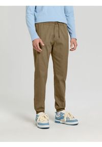 Sinsay - Spodnie jogger - beżowy. Kolor: beżowy