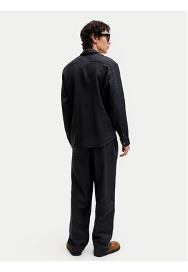 Jack & Jones Chinosy St. Karl 12253120 Czarny Loose Leg. Kolor: czarny. Materiał: len