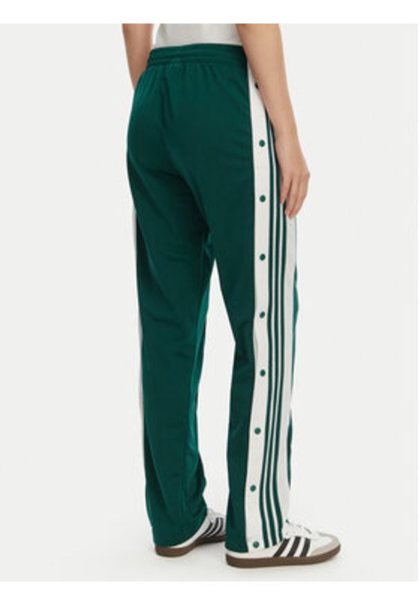 Adidas - adidas Spodnie dresowe Adibreak KD6327 Zielony Loose Fit. Kolor: zielony. Materiał: syntetyk