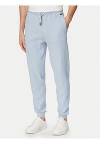 BOSS Spodnie dresowe Structure 50540577 Niebieski jasny Regular Fit. Kolor: niebieski. Materiał: syntetyk #1