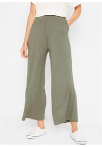 bonprix - Spodnie z dżerseju 7/8, z lejącej mieszanki wiskozy. Kolor: zielony. Materiał: jersey, wiskoza #1