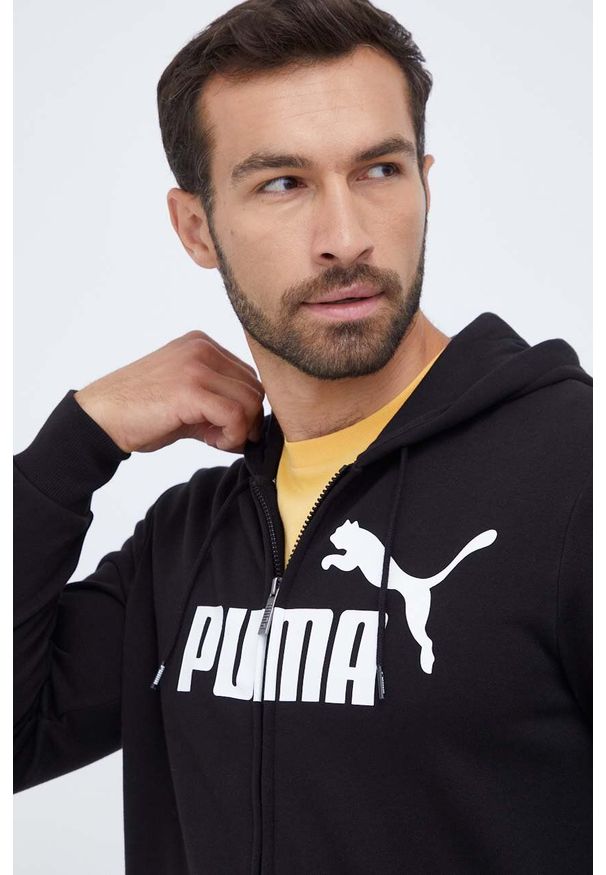 Puma bluza męska kolor czarny z kapturem z nadrukiem. Typ kołnierza: kaptur. Kolor: czarny. Materiał: materiał. Długość rękawa: długi rękaw. Długość: długie. Wzór: nadruk