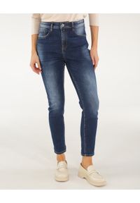 Unisono - JEANSY Z PRZETARCIAMI 42-1306 BLU SCUR. Materiał: jeans