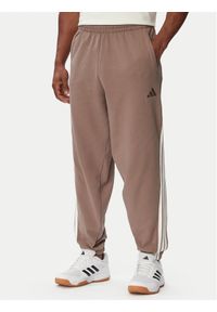 Adidas - adidas Spodnie dresowe Kit 3-Stripes Regular Cuffed KW2361 Beżowy Regular Fit. Kolor: beżowy. Materiał: bawełna #1